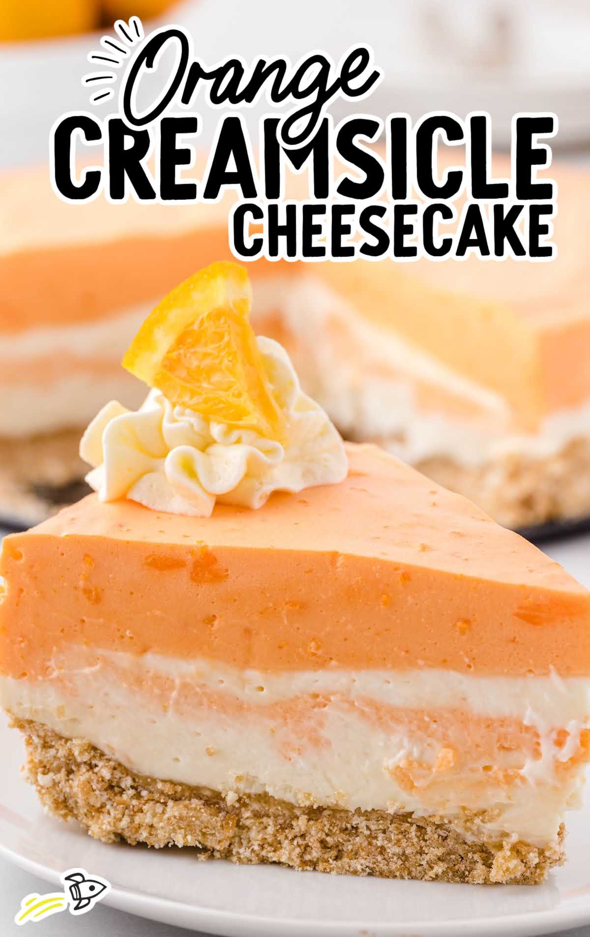 a slice of Orange Creamsicle Cake on a plate 