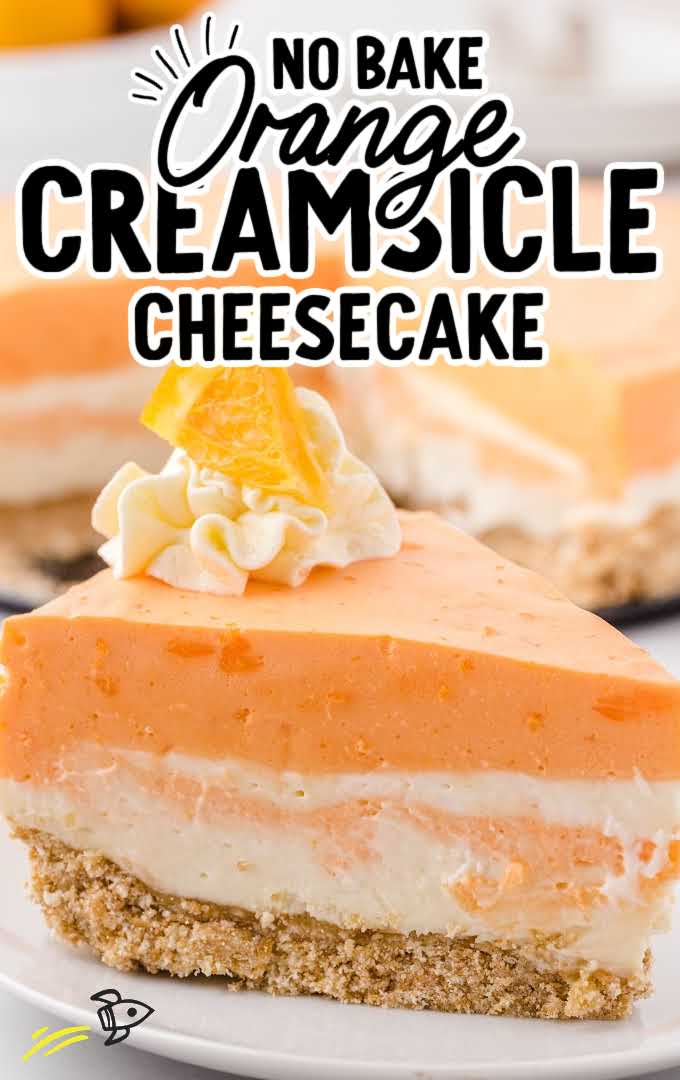 close up shot of a slice of no-bake orange creamsicle cheesecake on a plate