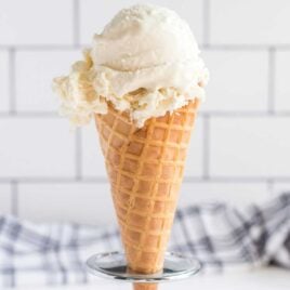 close up shot of a ice cream cone filled with No-Churn Vanilla Ice Cream