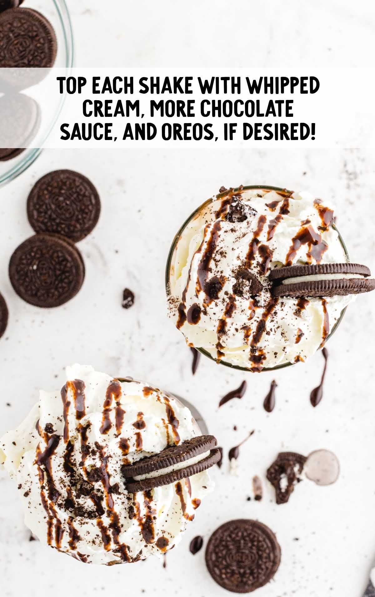 milkshake topped with whipped cream, chocolate syrup, and Oreos