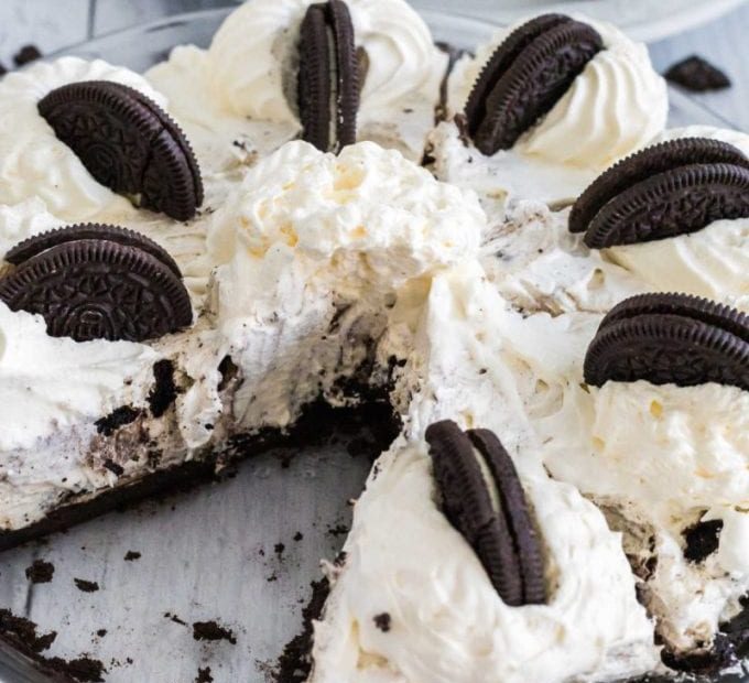 close up shot of Oreo Pie topped with whipped topping and Oreos in a baking dish