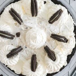 overhead shot of Oreo Pie topped with whipped topping and Oreos in a baking dish