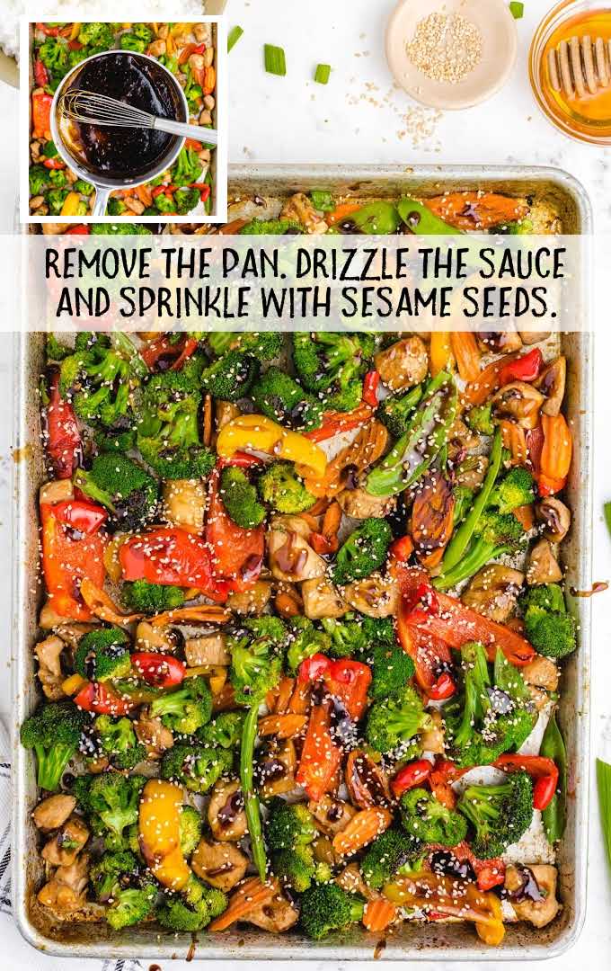 stir fry drizzled with sauce and sprinkled with sesame seeds in a sheet pan