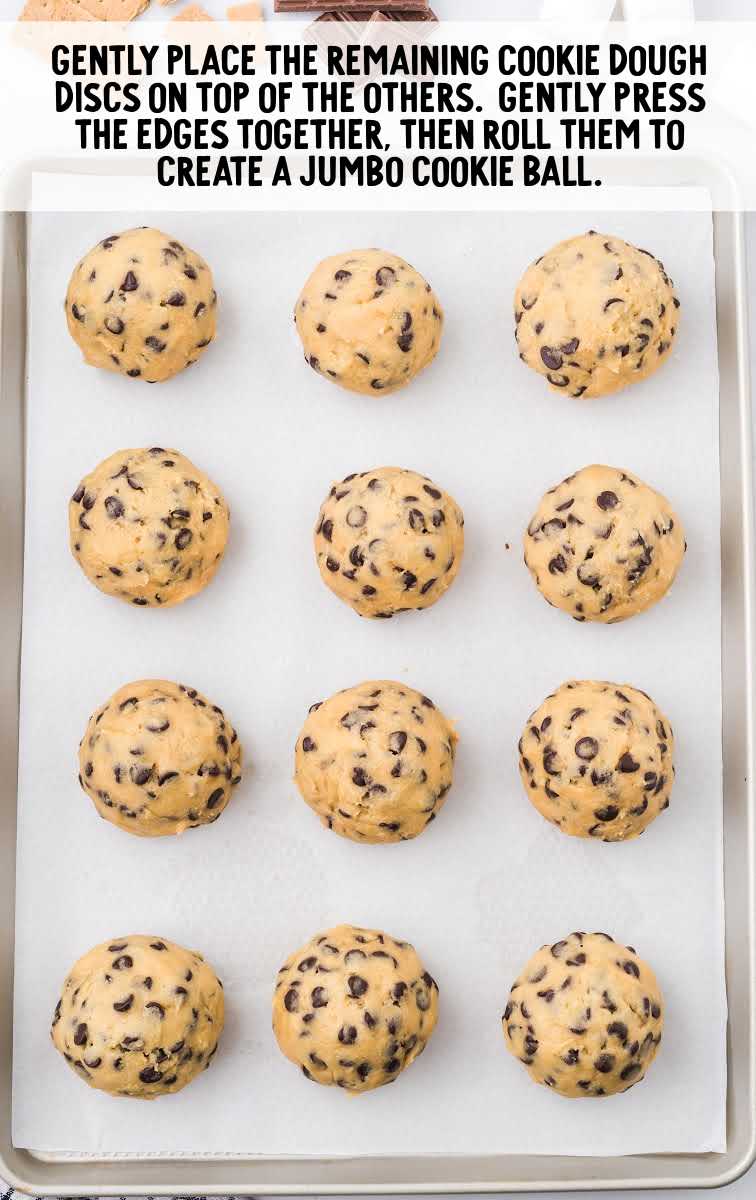 s'mores stuffed cookies process shot of cookie dough on a tin pan