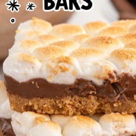 Pinterest image featuring s’mores bars with golden marshmallows and the text “Totally Addictive S’mores Bars – Oven Baked, Made in Minutes!”