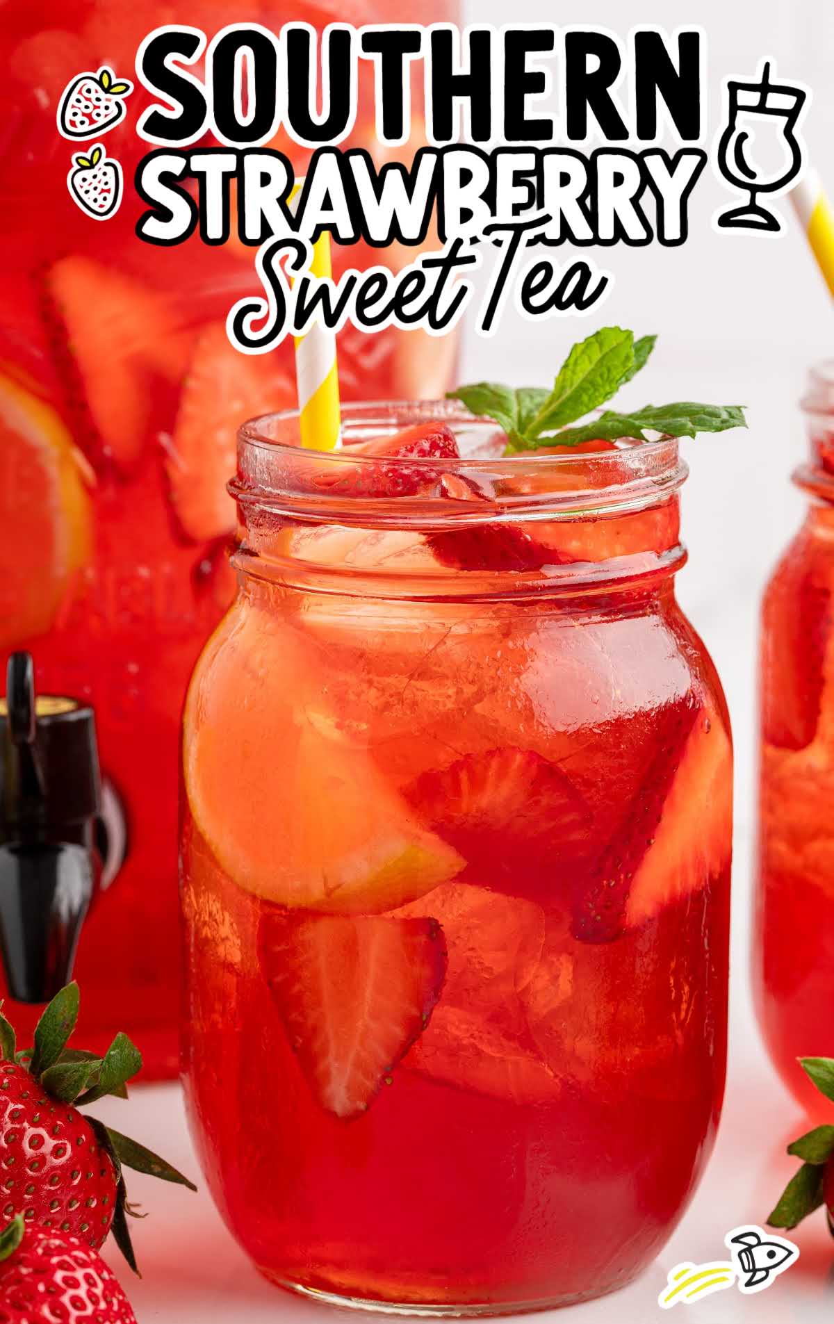 Close-up of a mason jar filled with strawberry sweet tea and lemon, with text overlay “Southern Strawberry Sweet Tea.”