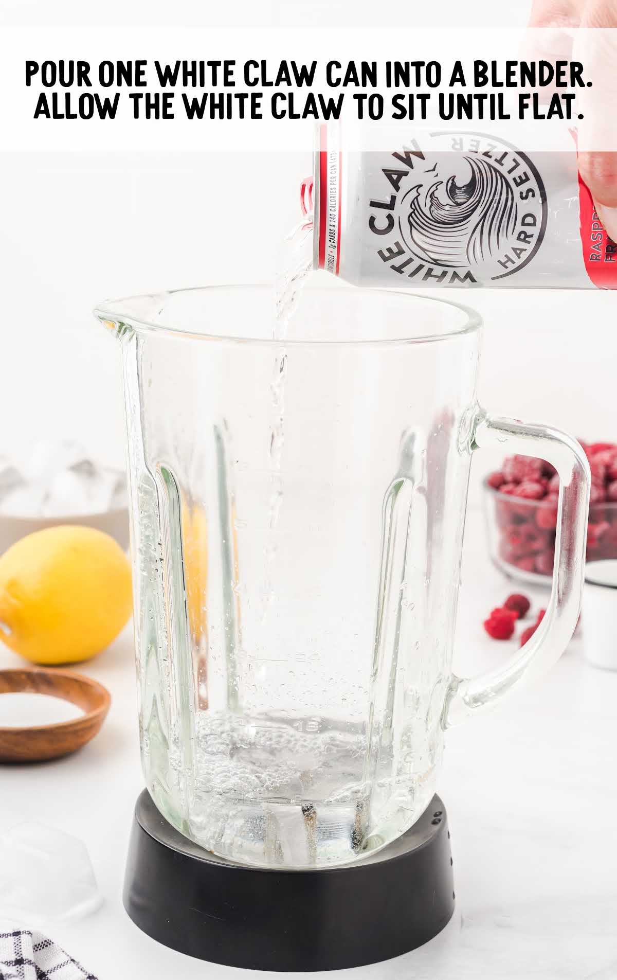white claw being poured into a blender