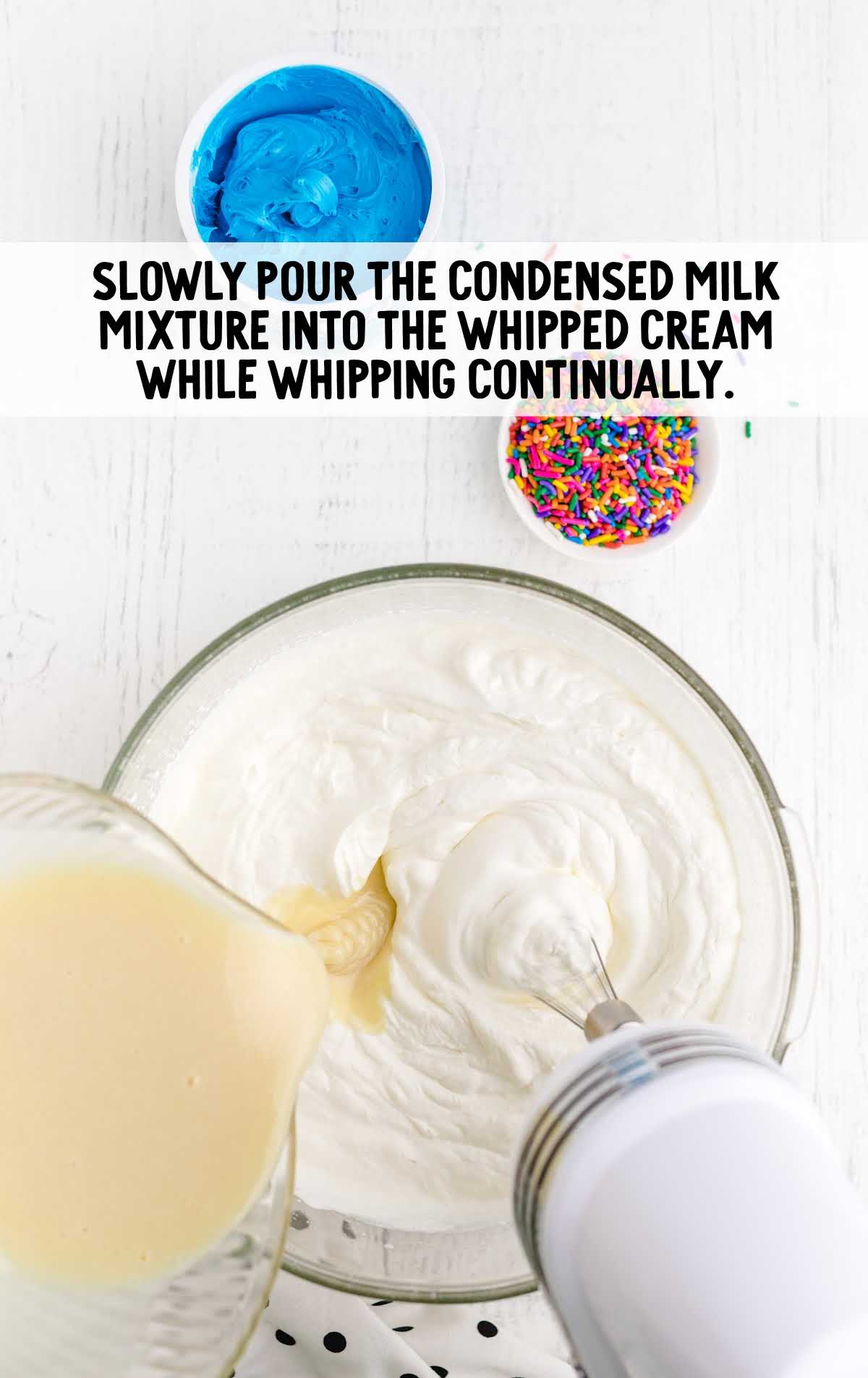 condensed milk mixture and whipping cream blended together in a bowl