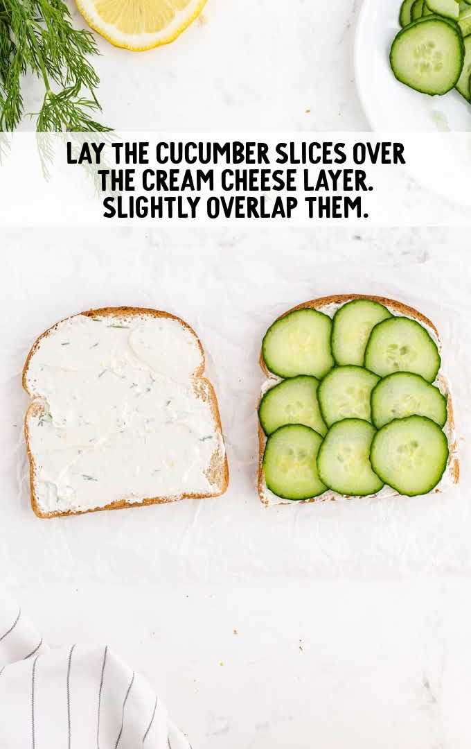 cream cheese and cucumber slices placed on to bread