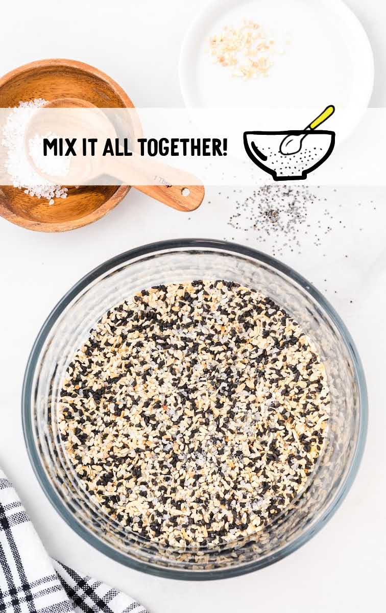 everything bagel seasoning process shot of ingredients being mixed together in a bowl