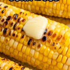 Melted butter on hot grilled corn with charred kernels and text overlay “Grilled Corn on the Cob – No Soaking! Ready in 20 Minutes!”