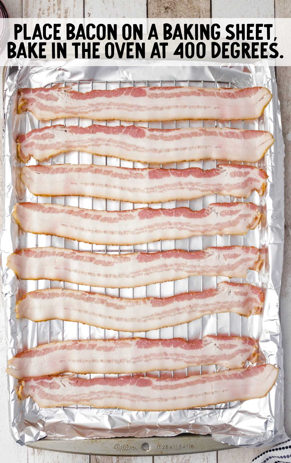 uncooked bacon on a baking sheet