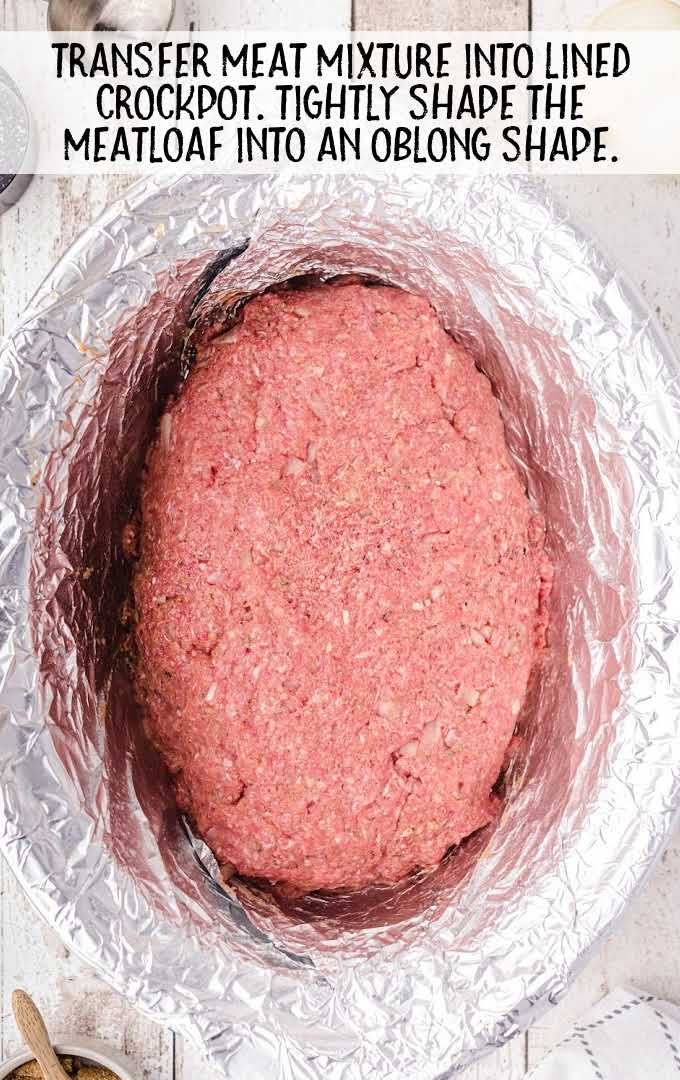crockpot meatloaf process shot of meatloaf in a crockpot wrapped in aluminum foil
