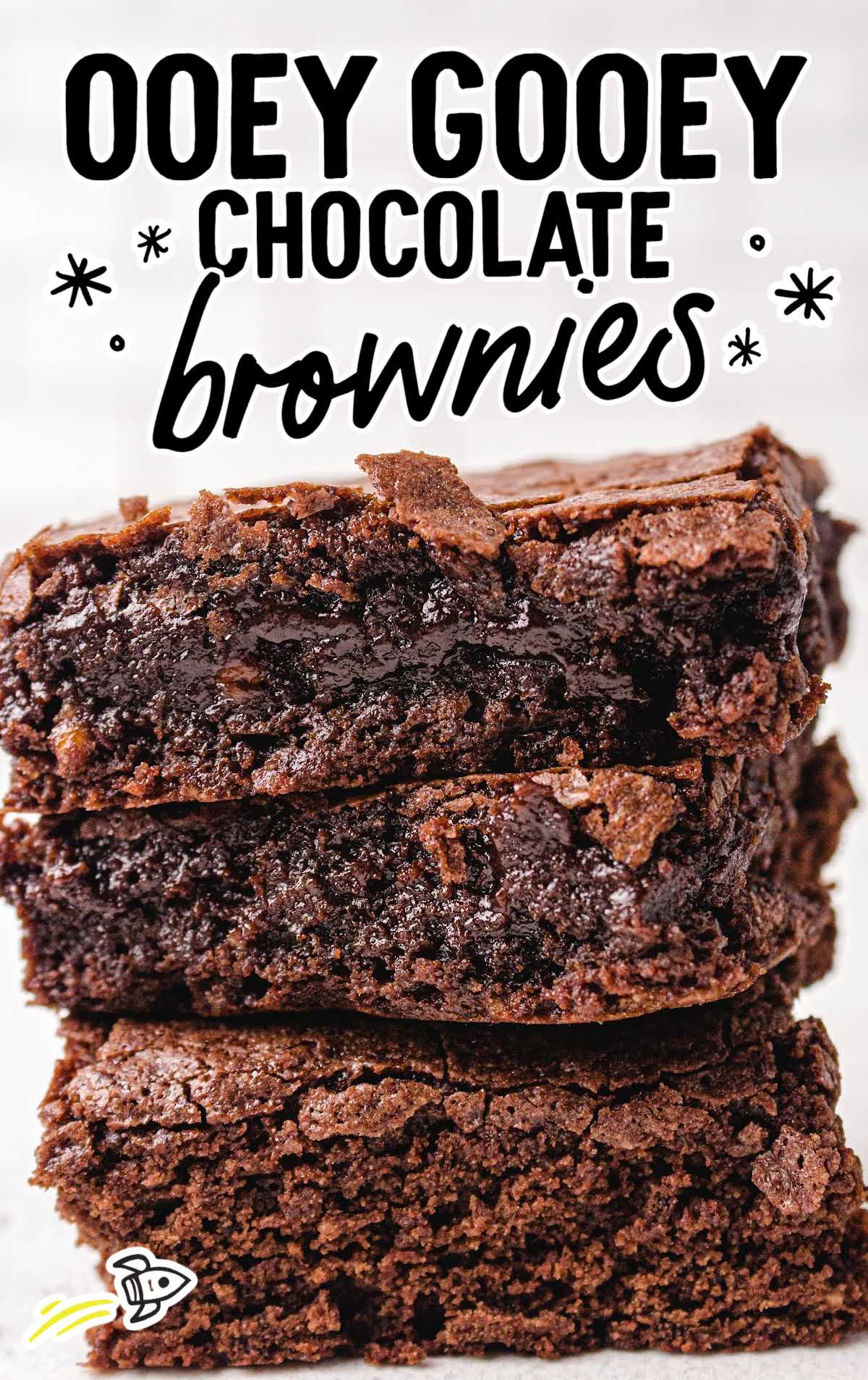 close up shot of chocolate brownies stacked on top of each other