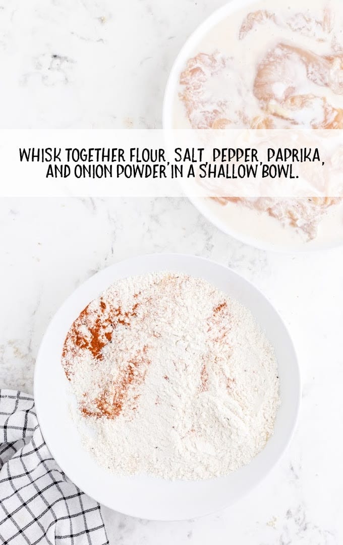 flour, salt, pepper, paprika, and onion powder whisked together 