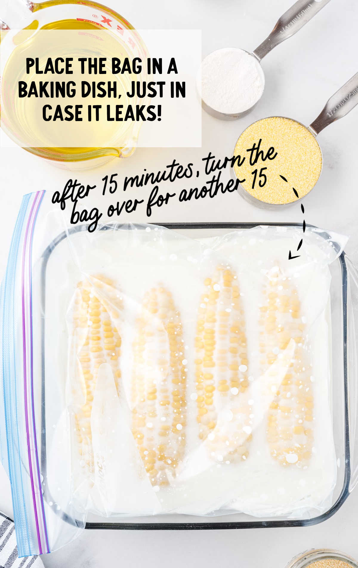 Ziploc bag with corn soaking in buttermilk, placed inside a glass baking dish for marination