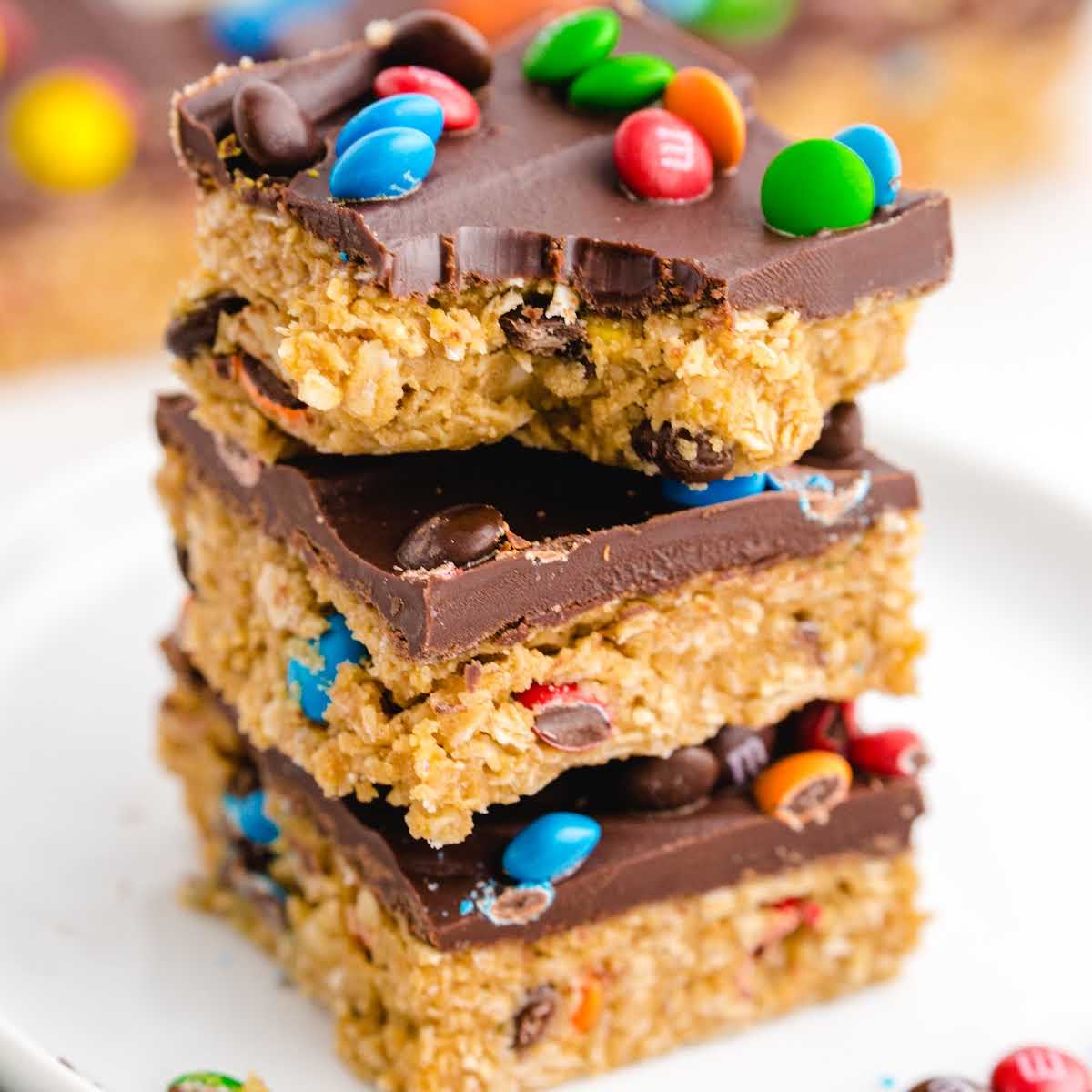 close up shot of no bake monster cookies stacked on top of each other