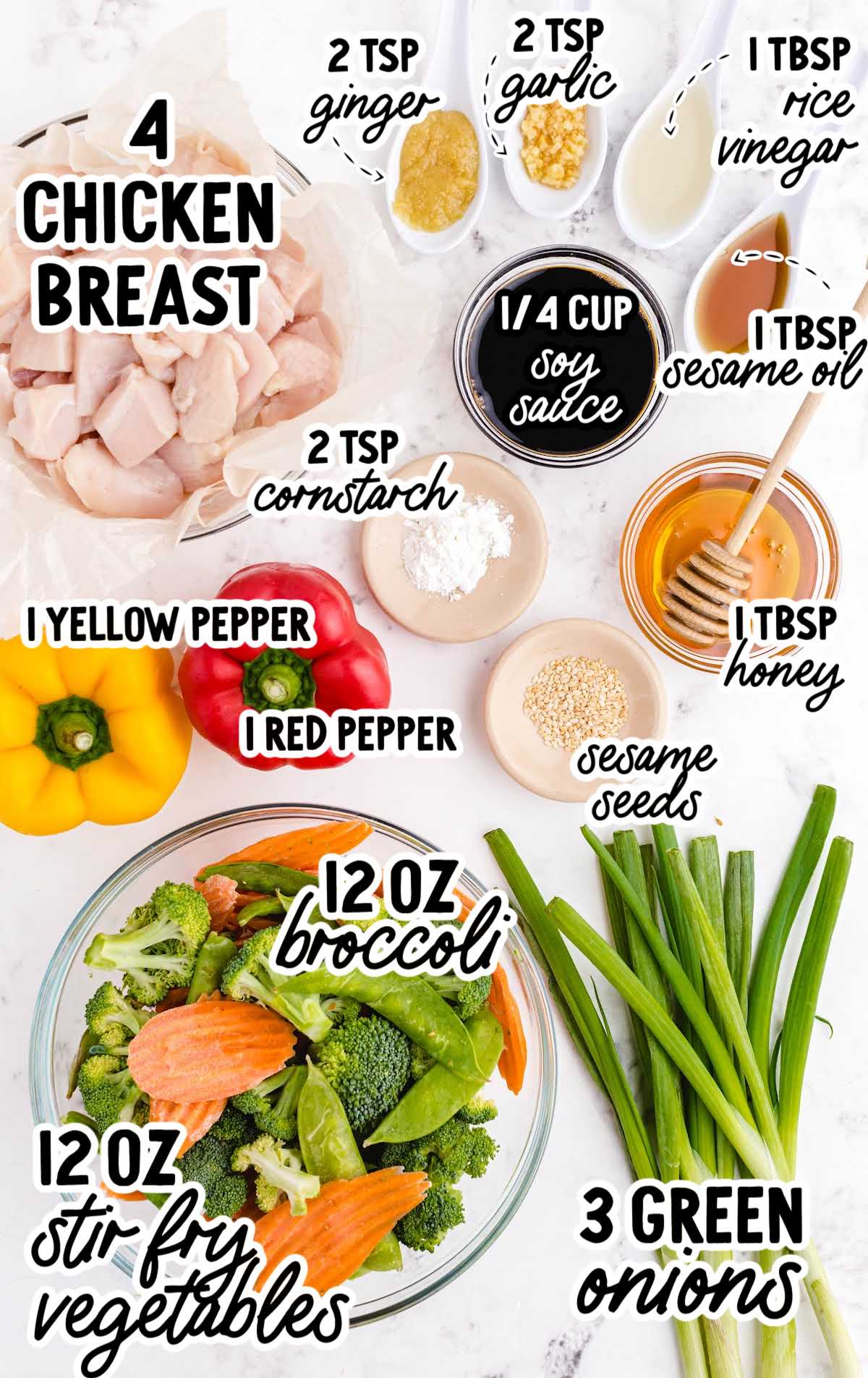 Flat lay of ingredients for sheet pan stir fry including chicken, bell peppers, broccoli, soy sauce, and seasonings.
