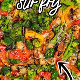 Vertical image of colorful sheet pan stir fry labeled “The Best Sheet Pan Stir Fry” with homemade sauce text overlay.