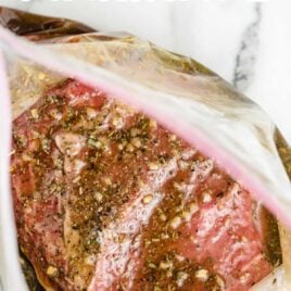 close up shot of a steak in a ziploc bag of Steak marinade