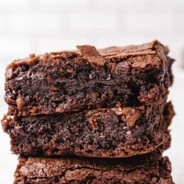 close up shot of egg white brownies stacked on top of each other