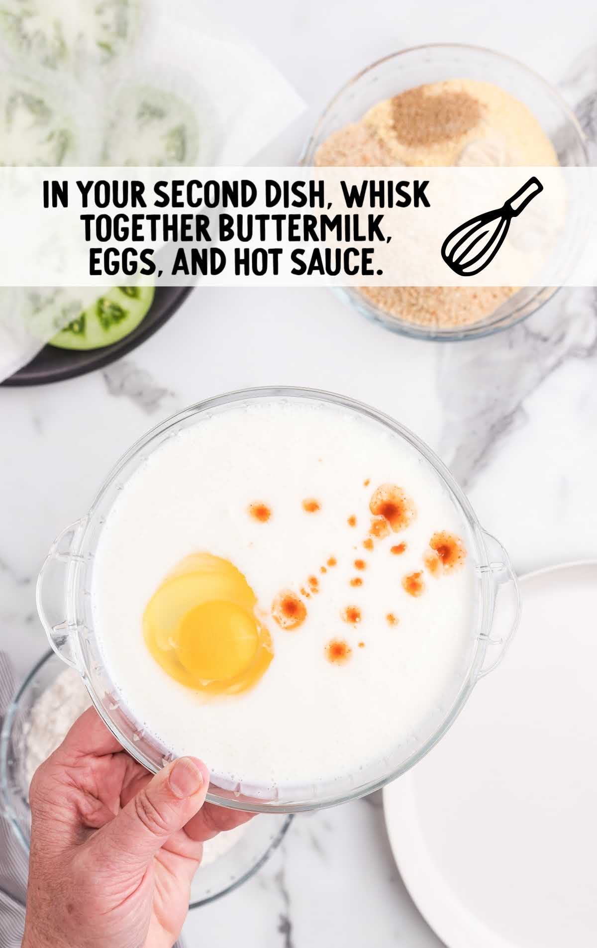 buttermilk, eggs, and hot sauce whisked together