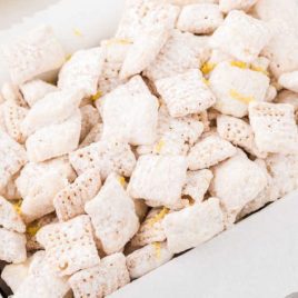close up shot of lemon puppy chow in a serving tray