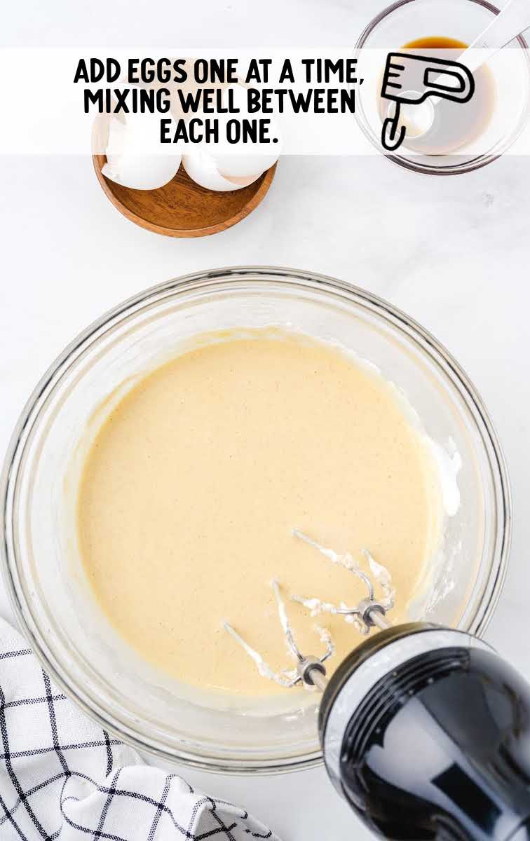 mini cinnamon roll cheesecakes process shot of ingredients being blended together