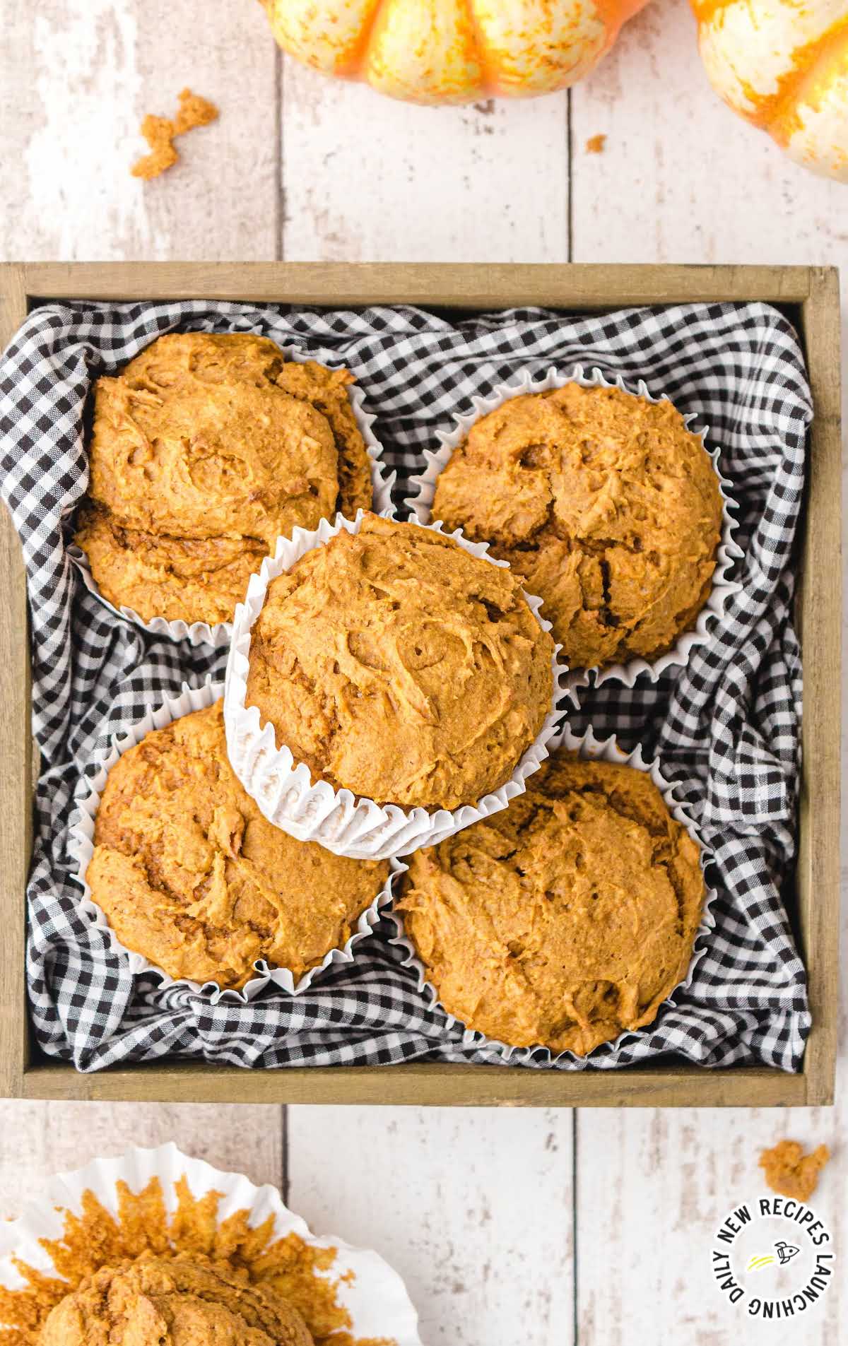 overhead shot of Pumpkin Spice Muffins in a serving container