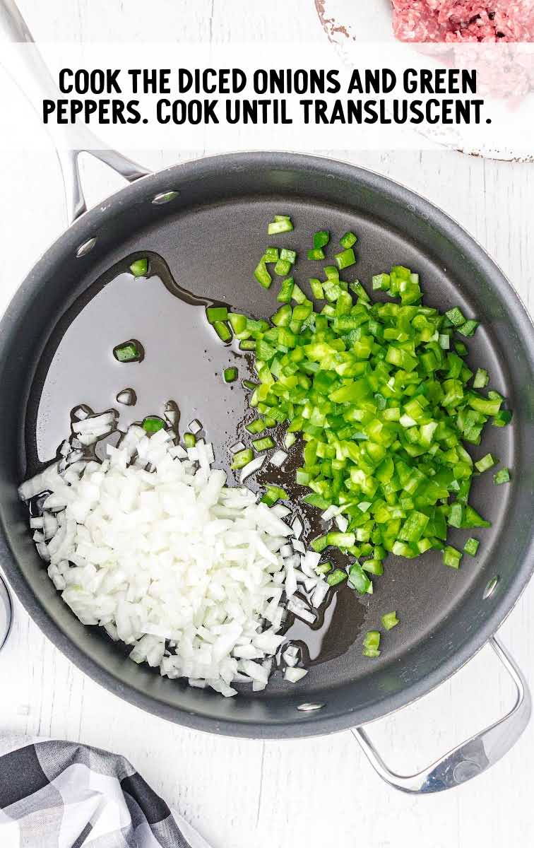 amish casserole process shot of diced onions and diced green peppers being cooked in a skillet