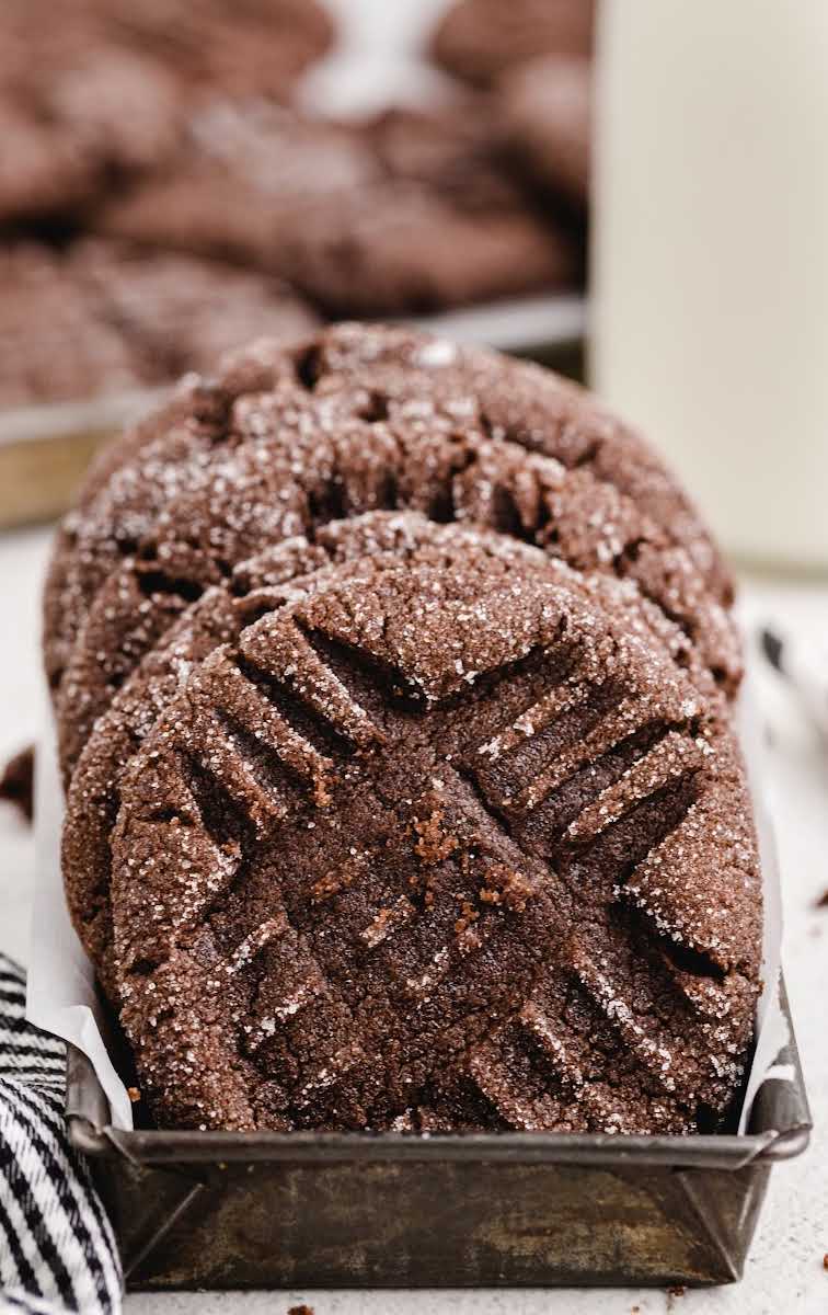 close up shot of a line of Chocolate Peanut Butter Cookies in a serving dish