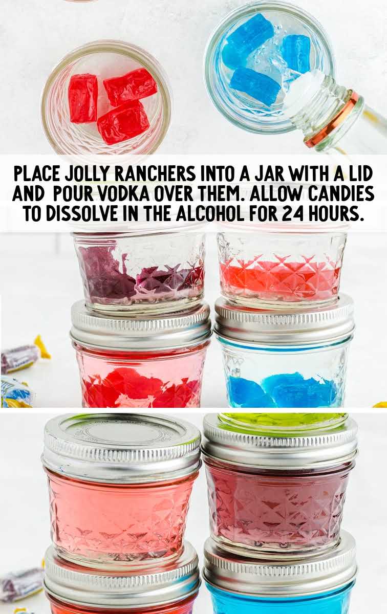 Jolly rancher drink process shot of holly ranches filled with vodka in mason jars