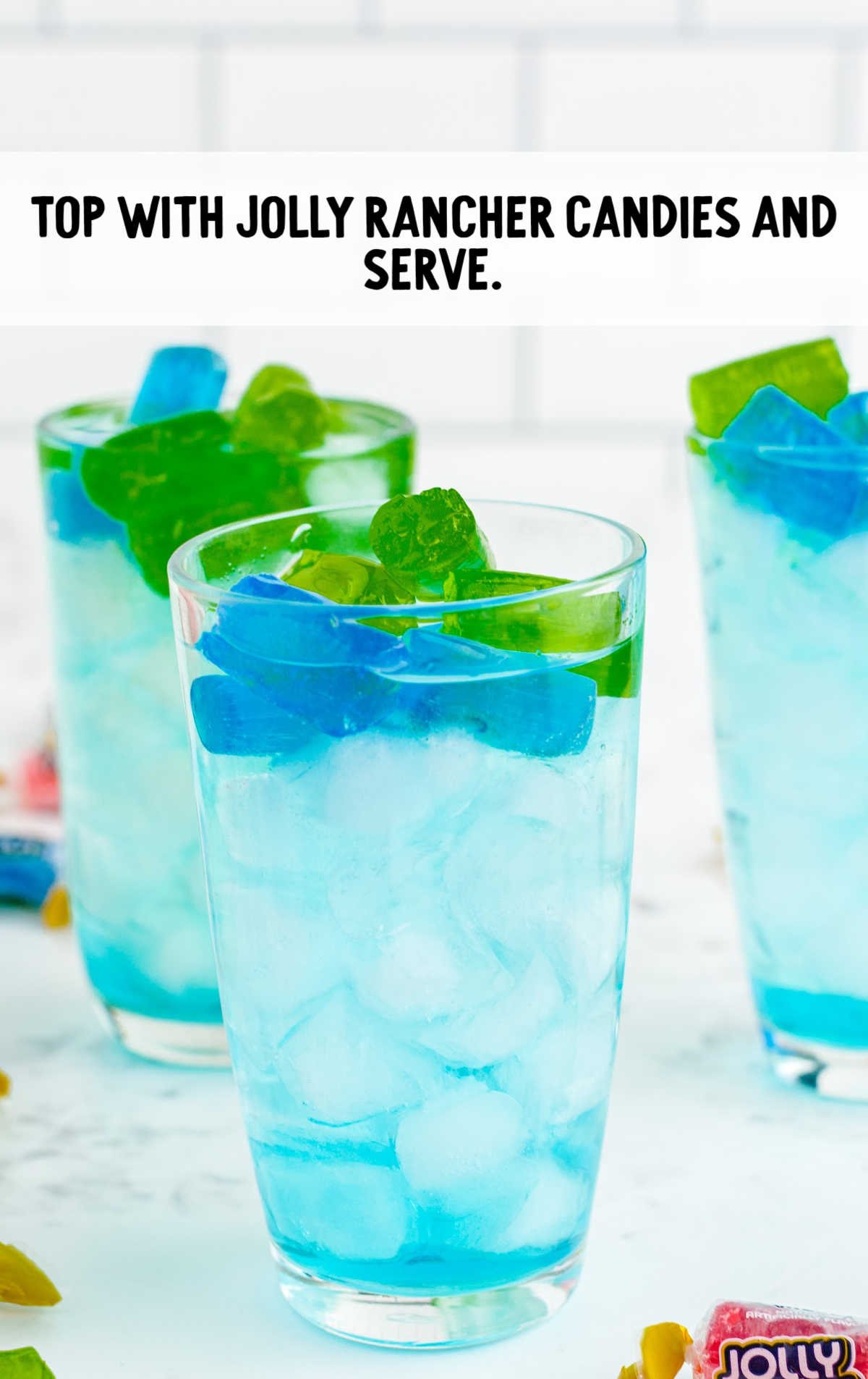 drinks being topped with jolly ranchers