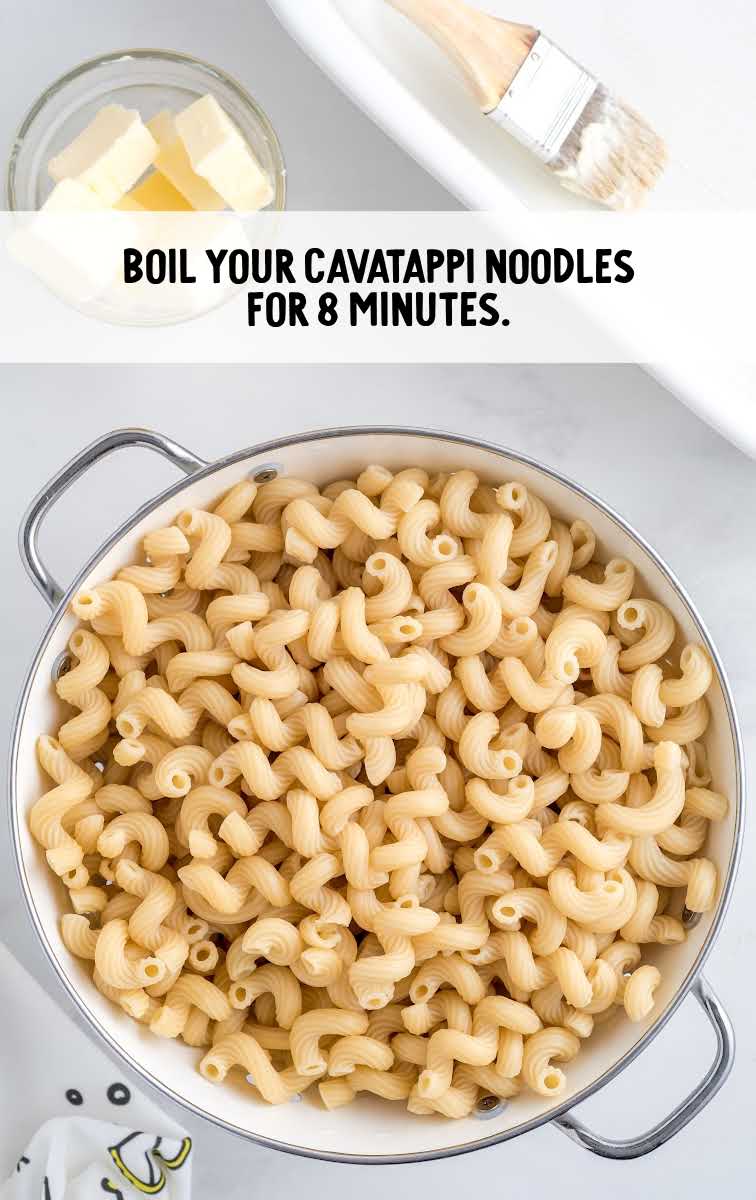 Million Dollar Mac and Cheese process shot of cavatappi noodles in a pot