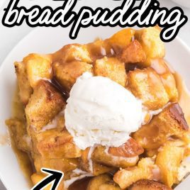 close up overhead shot of a slice of Peach Bread Pudding topped with vanilla ice cream on a plate