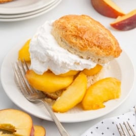 a plate of Peach Shortcake with a fork