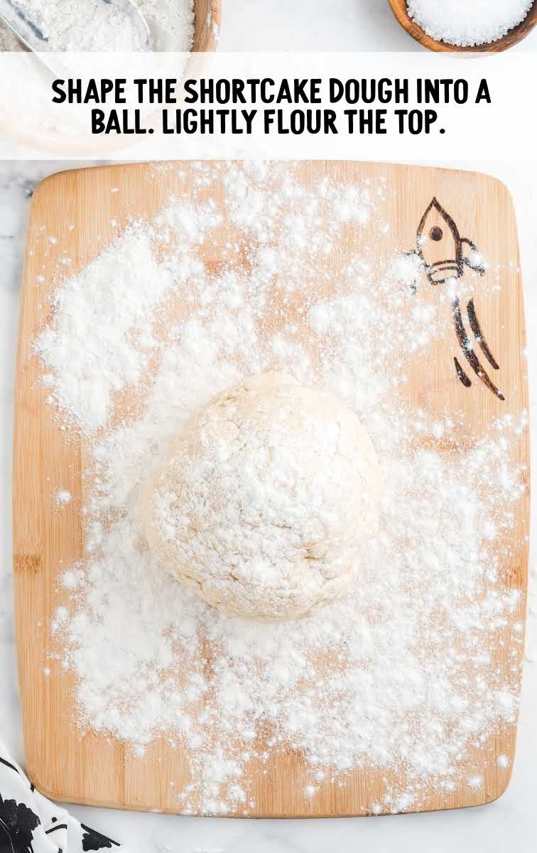 Peach Shortcake process shot of dough being floured on a wooden board