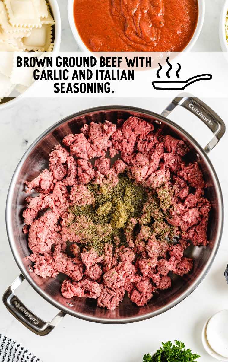 Ravioli Lasagna process shot of ground beef and seasoning in a pot