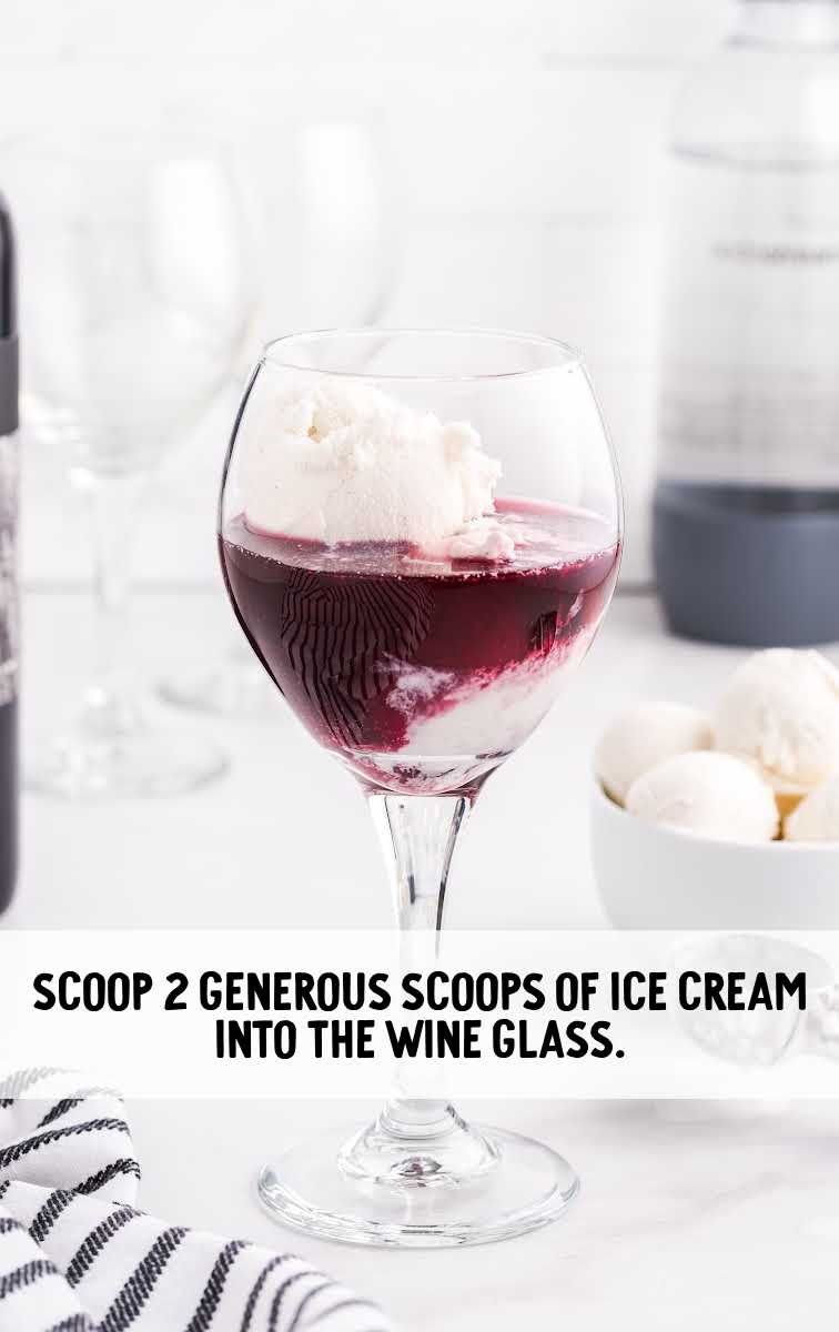 Red Wine Floats process shot of scoops of vanilla ice cream in a wine glass