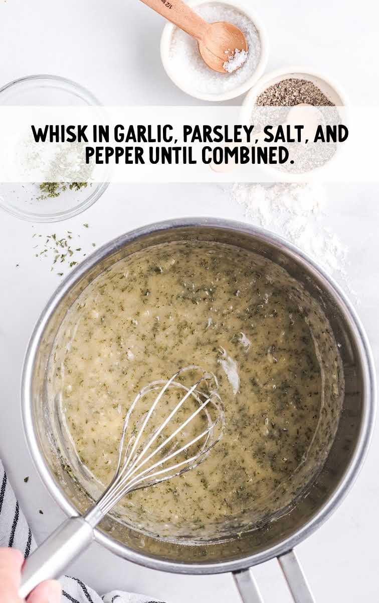 garlic, parsley, salt, and pepper whisked together in a pot