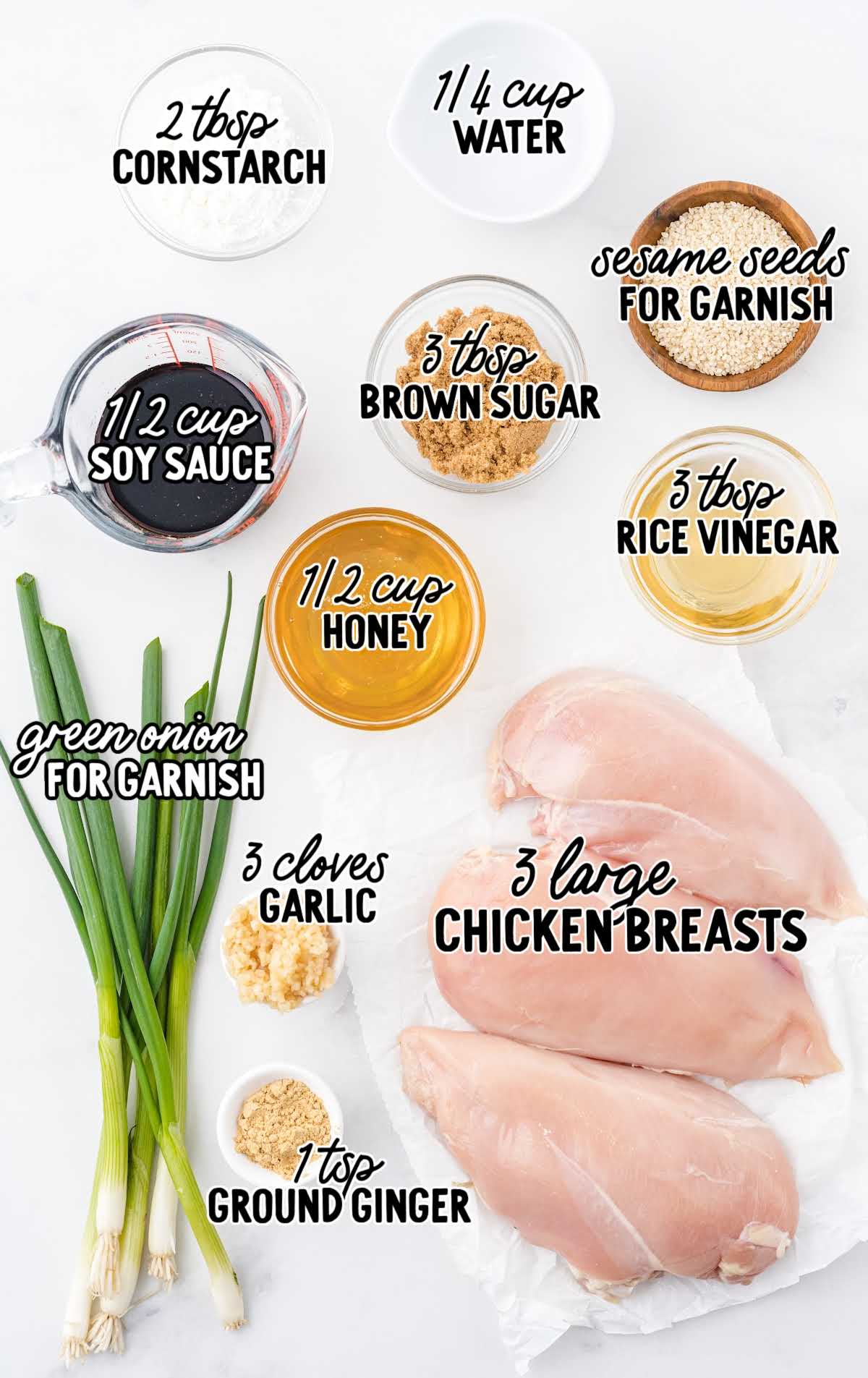 Ingredients for slow cooker teriyaki chicken including chicken breasts soy sauce honey garlic ginger and cornstarch