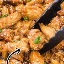 Crockpot chicken teriyaki served over white rice with sesame seeds and green onions kids love this easy slow cooker dinner