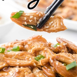 Crockpot chicken teriyaki close up showing juicy shredded chicken in homemade teriyaki sauce with sesame seeds