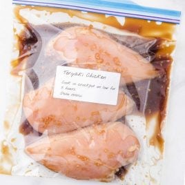 close up shot crockpot chicken teriyaki in a labeled plastic bag