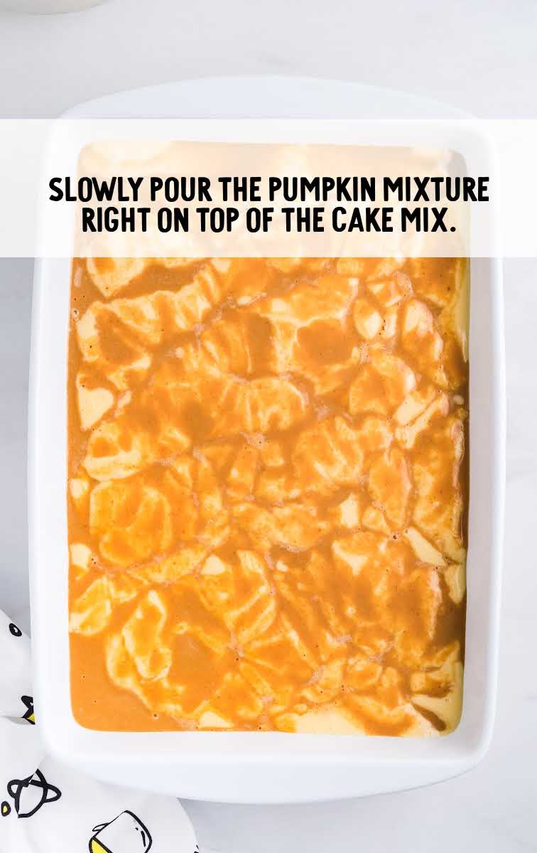 Pumpkin Magic Cake process shot of pumpkin mixture being poured on top of cake mix in a baking dish