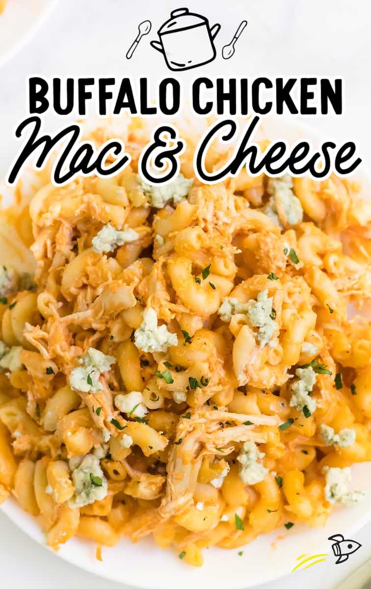 close up overhead shot of a serving of Buffalo Chicken Mac and Cheese garnished with parsley on a plate