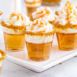 a serving tray covered in Butterbeer Jello Shots.