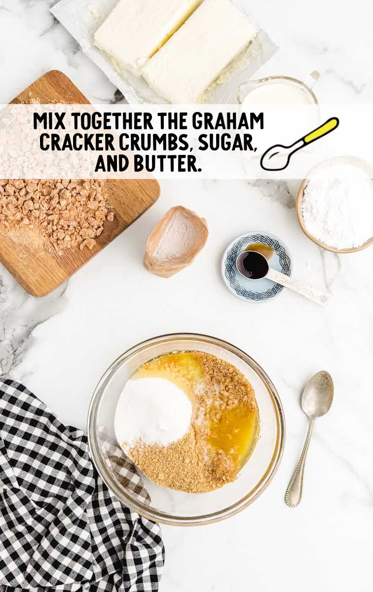 graham cracker crumbs, sugar, and melted butter combined in a bowl