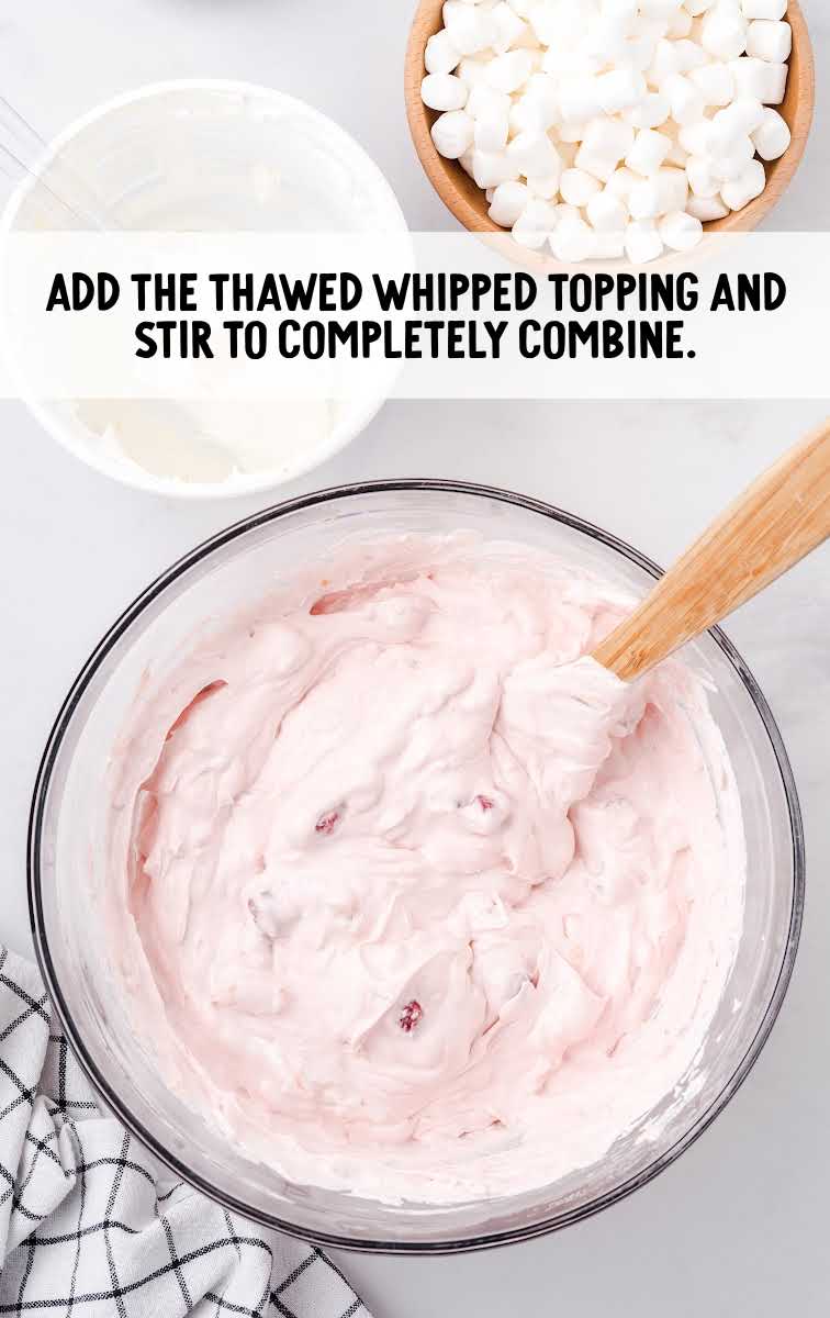 whipped topping added to the mixture in a bowl