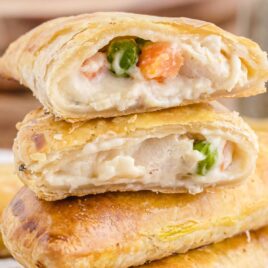 close up shot of Chicken Hand Pies stack on top of each other